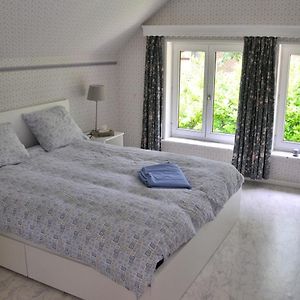 Kamer met een Queen Size Bed